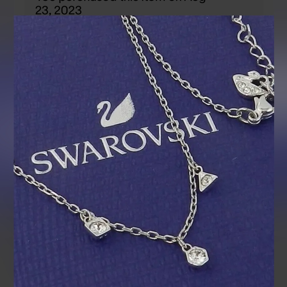 25. Swarovski three Crystal necklace with logo clasp new in original…
